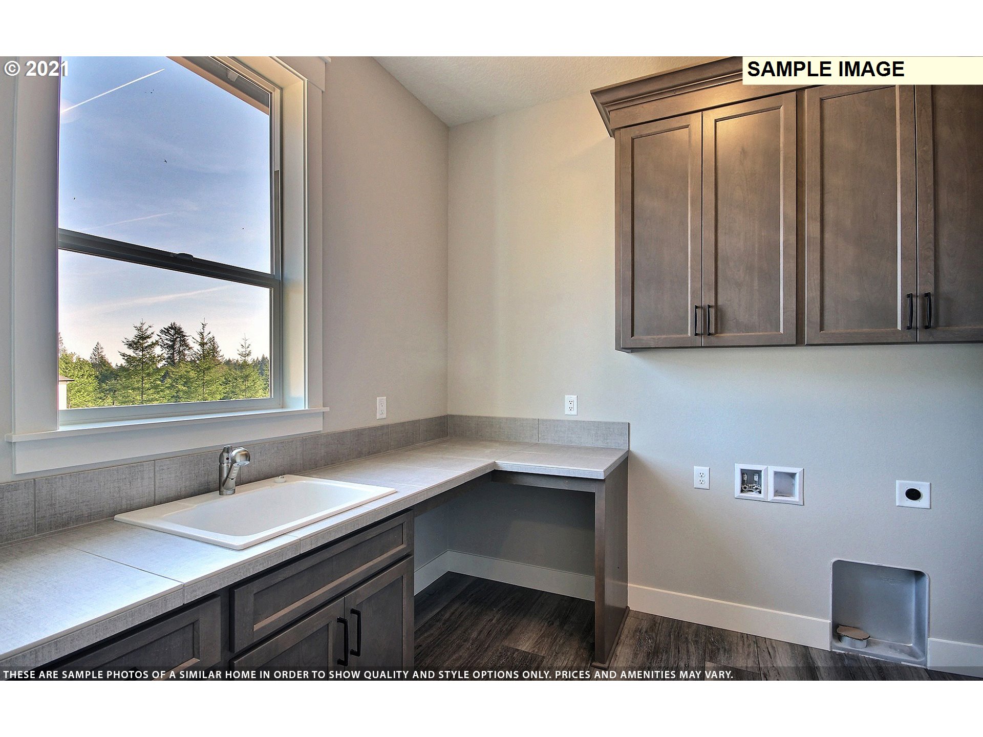 3338 Northwest Tanner Street Camas, WA 98607 - Photo 25 of 25 a bathroom with a sink and a mirror