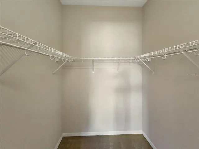 a view of a room with racks on the wall