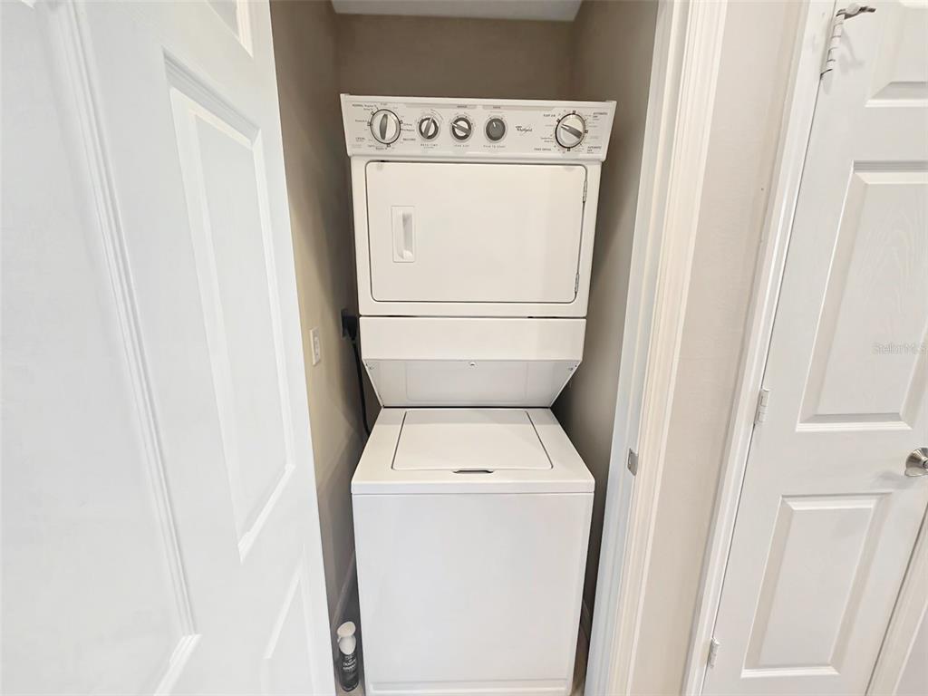 4203 Overture Circle Bradenton, FL 34209 - Photo 19 of 25 a utility room with dryer and washer
