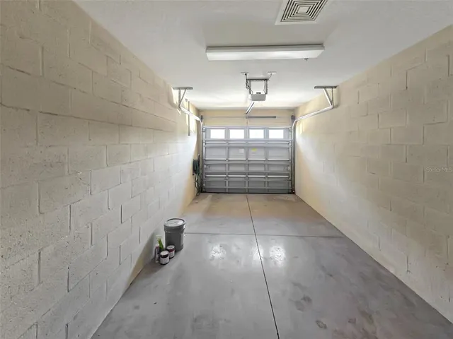 a view of empty room with empty shelves