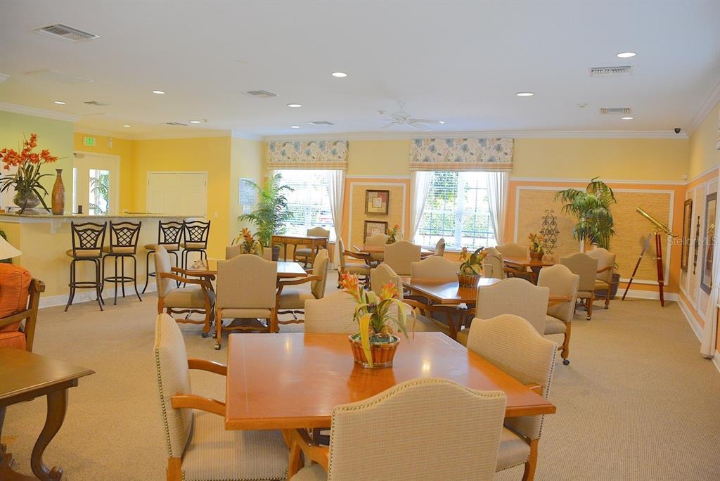 4203 Overture Circle Bradenton, FL 34209 - Photo 24 of 25 a living room with lots of furniture and a large window