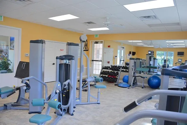 a view of a room with gym equipment