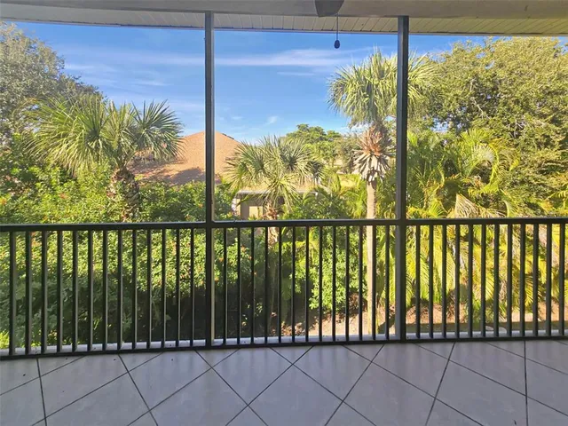 a view of a street from a balcony