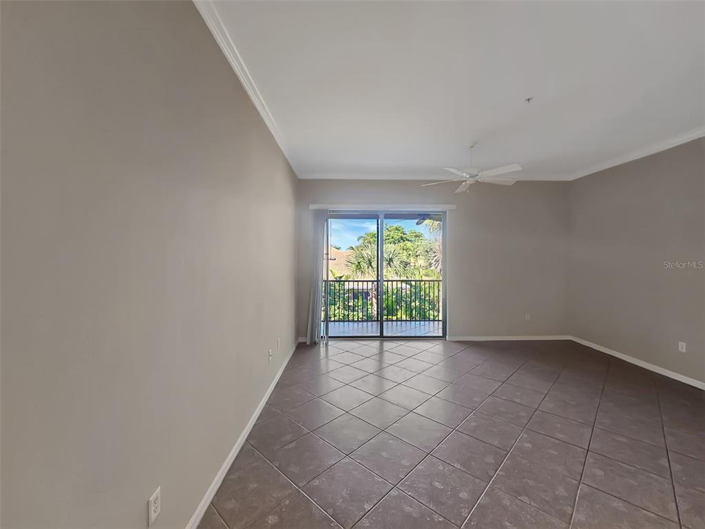 4203 Overture Circle Bradenton, FL 34209 - Photo 10 of 25 an empty room with windows