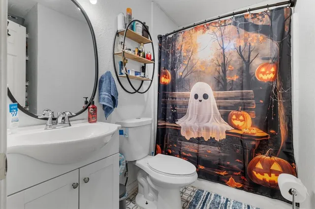 a view of a wooden house with a yard