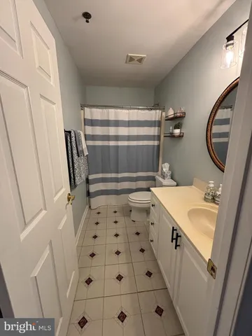 a sign on the side of a street