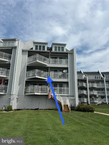 a view of pool with yard