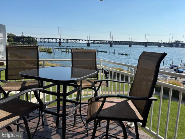 a view of a chairs and table on the terrace