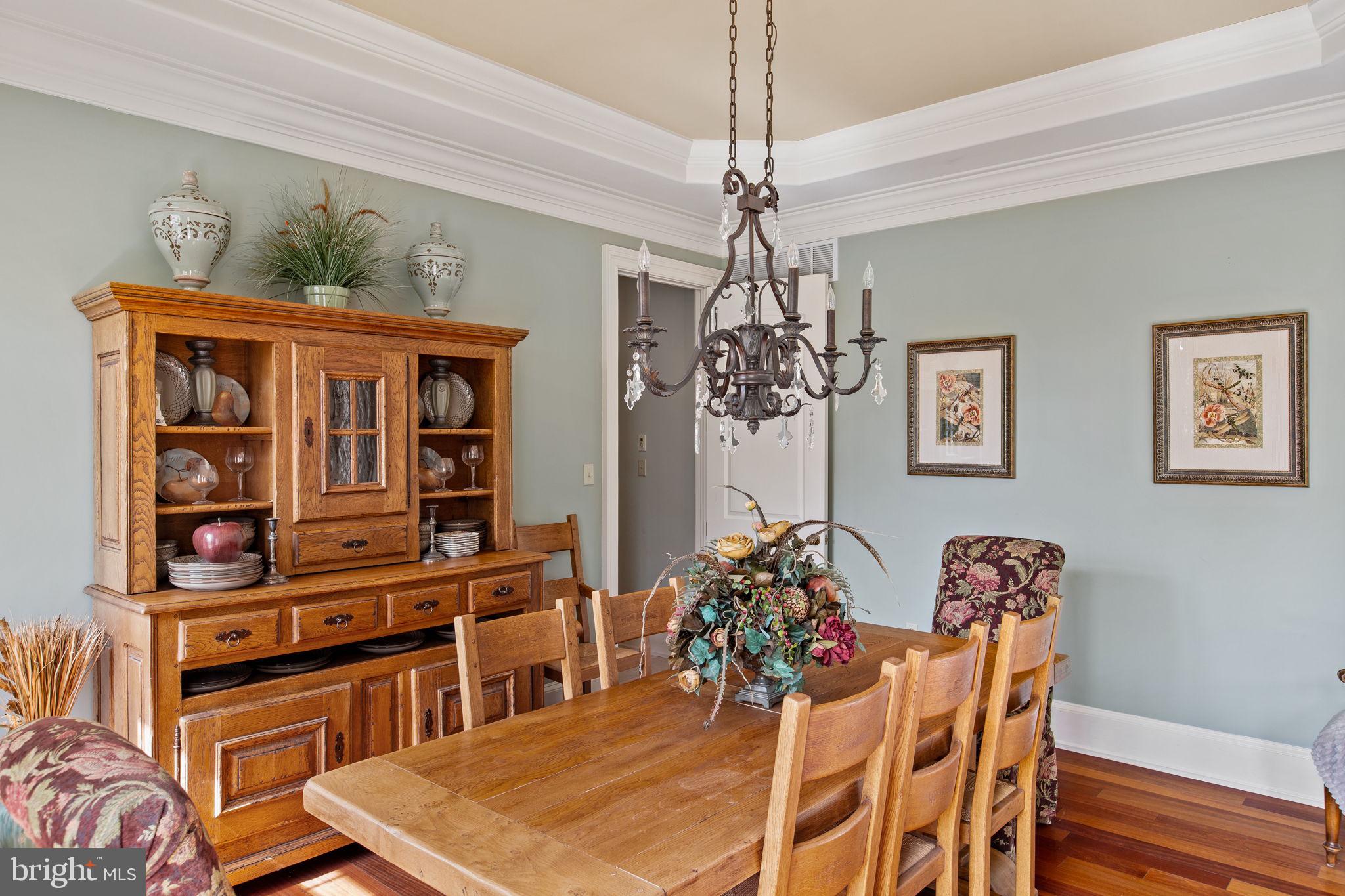 1519 Cedar Hill Road Lower Gwynedd, PA 19002 - Photo 17 of 95 a dining room with furniture a chandelier and window