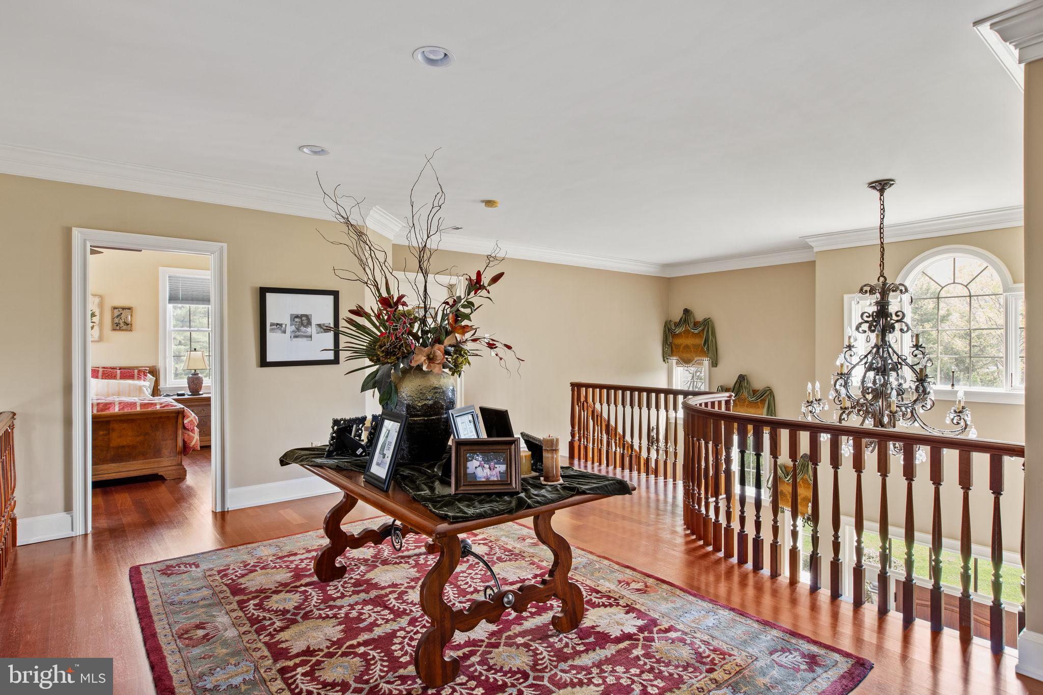 1519 Cedar Hill Road Lower Gwynedd, PA 19002 - Photo 35 of 95 a living room with furniture and a chandelier