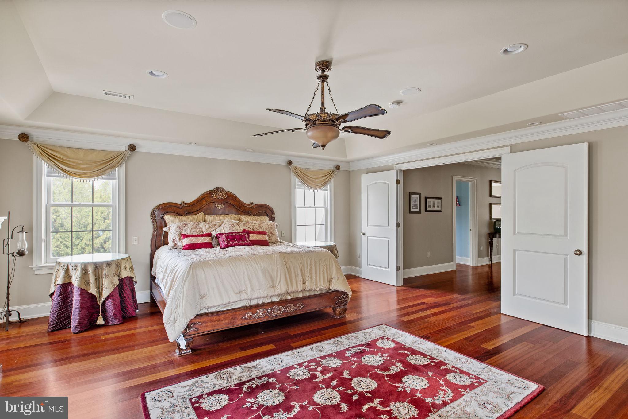 1519 Cedar Hill Road Lower Gwynedd, PA 19002 - Photo 39 of 95 a bedroom with a bed and wooden floor
