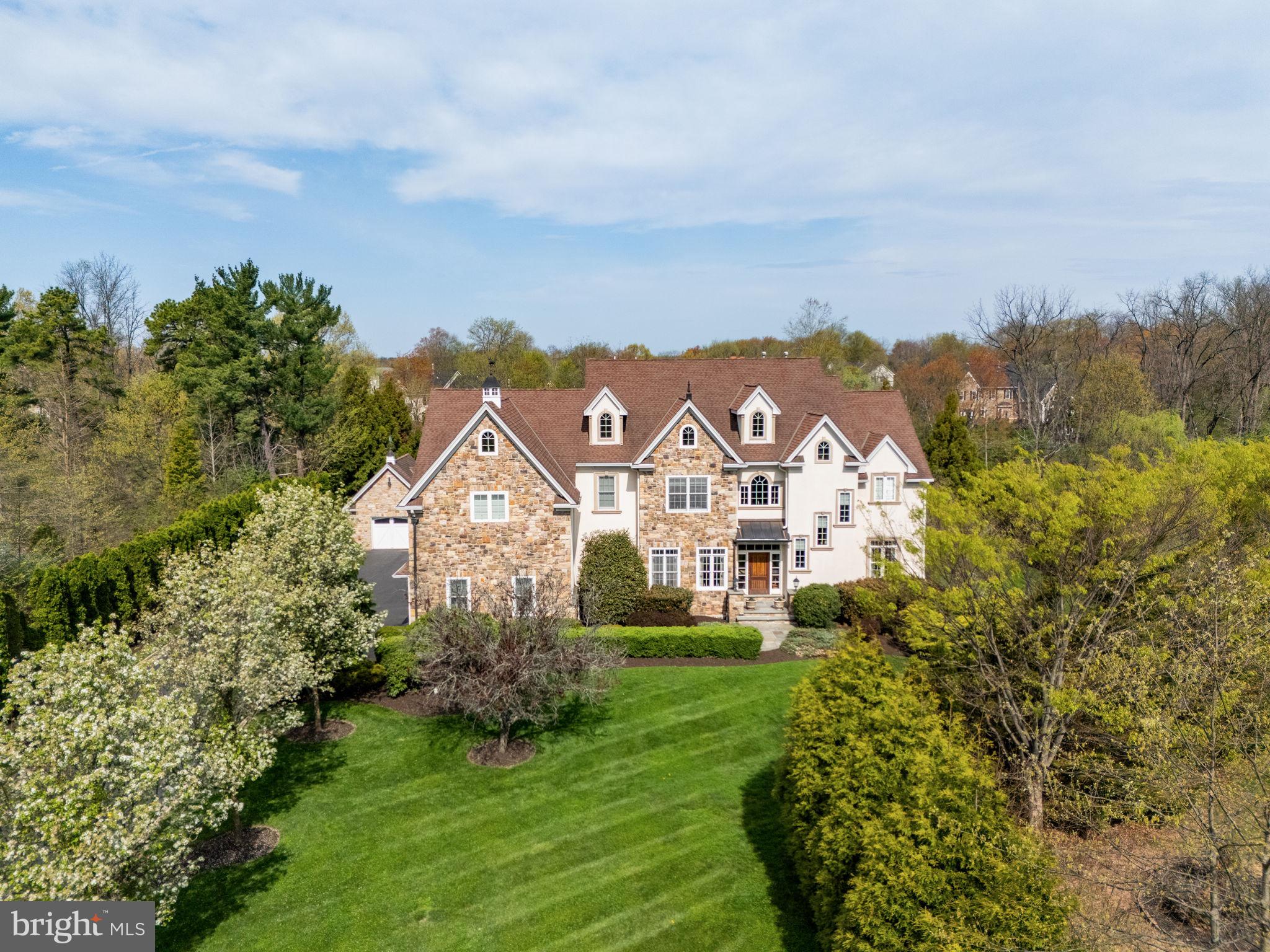 1519 Cedar Hill Road Lower Gwynedd, PA 19002 - Photo 4 of 95 a view of a big house with a big yard and large tree