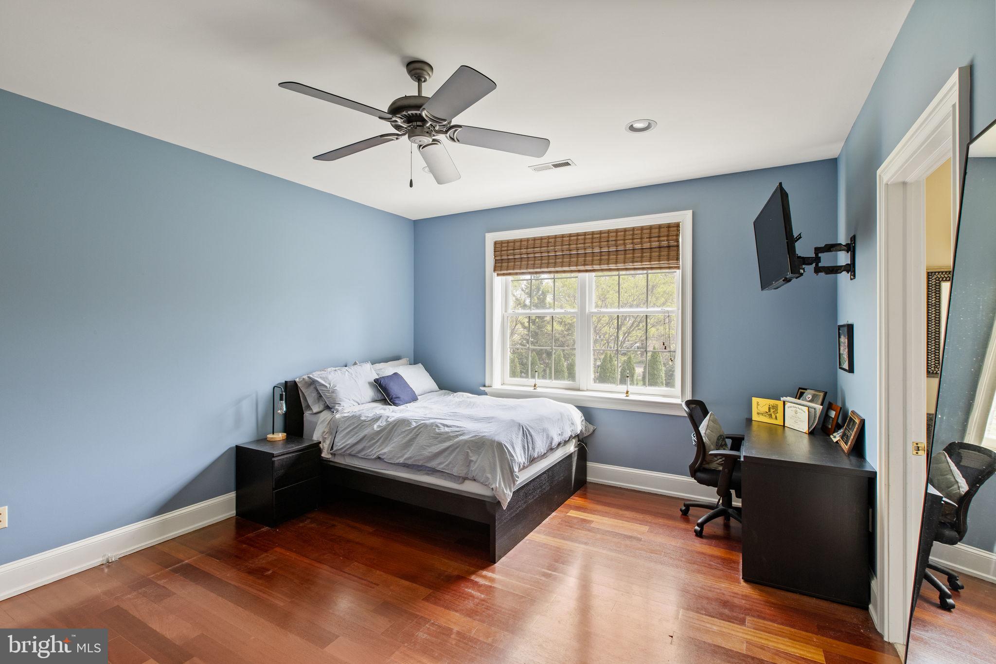 1519 Cedar Hill Road Lower Gwynedd, PA 19002 - Photo 49 of 95 a bedroom with a bed and wooden floor
