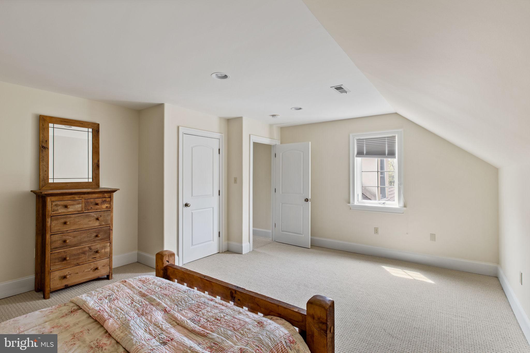 1519 Cedar Hill Road Lower Gwynedd, PA 19002 - Photo 55 of 95 a bedroom with a bed and a cabinets