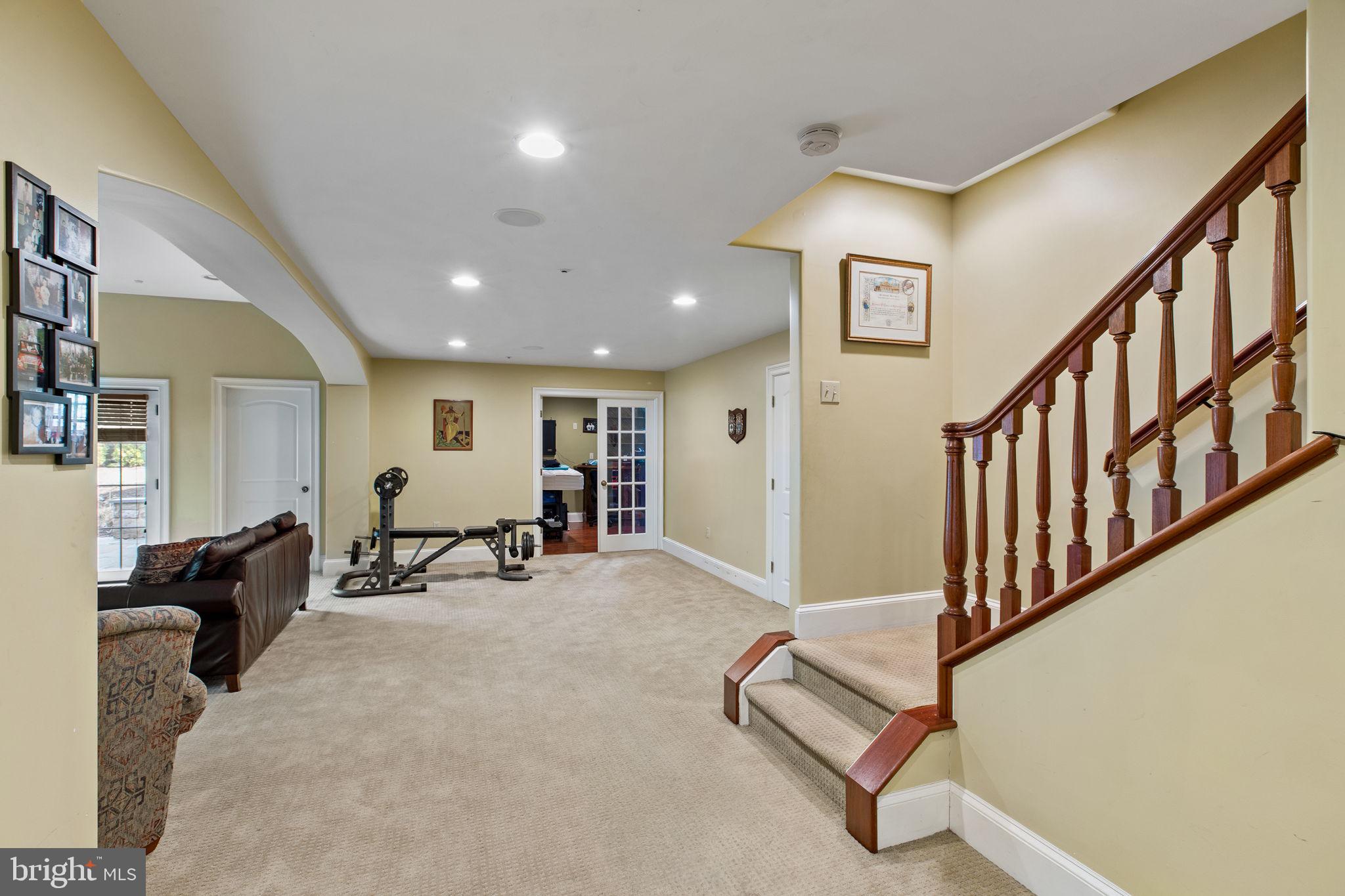 1519 Cedar Hill Road Lower Gwynedd, PA 19002 - Photo 76 of 95 a living room with furniture and wooden floor