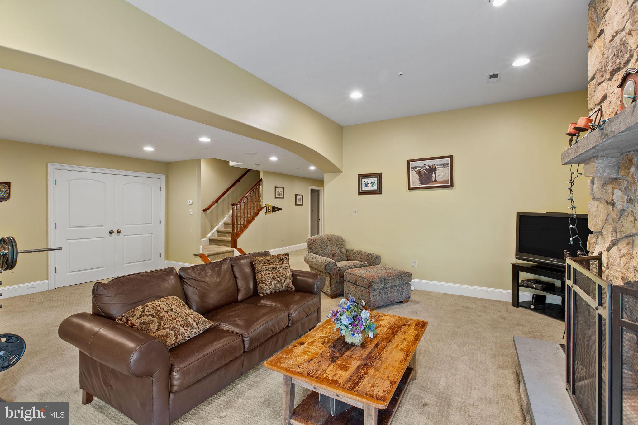 1519 Cedar Hill Road Lower Gwynedd, PA 19002 - Photo 79 of 95 a living room with furniture and a flat screen tv