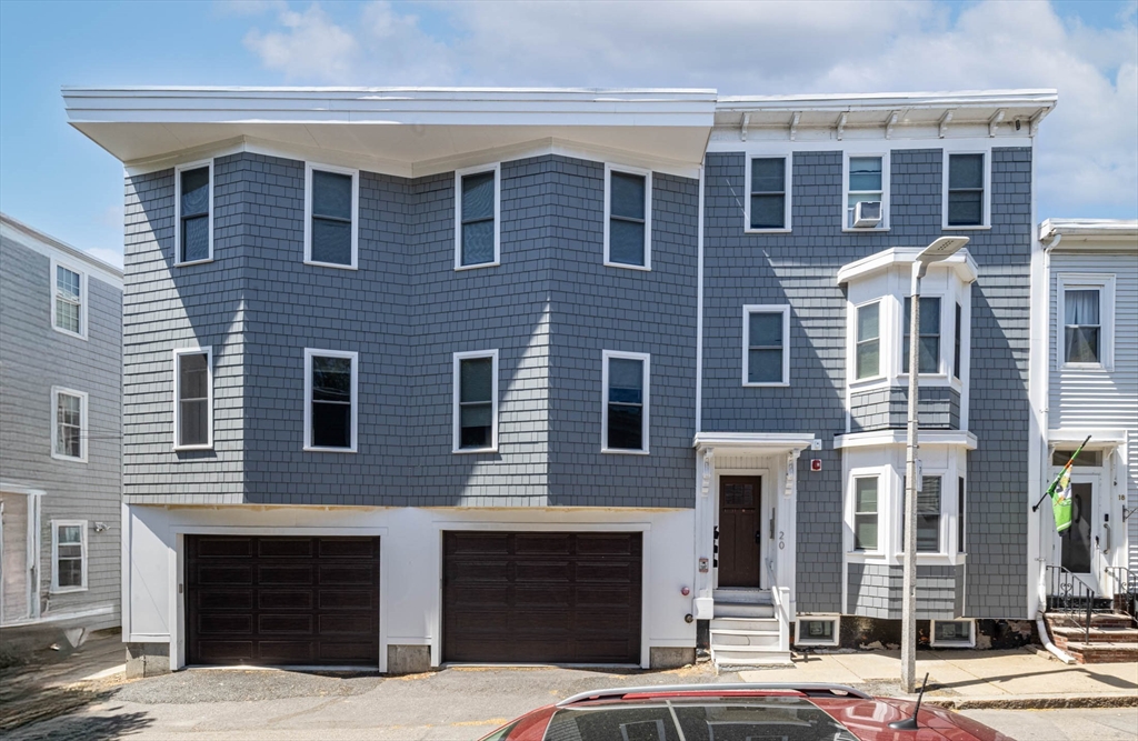 20 Grimes Street, Unit SF Boston, MA 02127 - Photo 15 of 15 a front view of a building with street