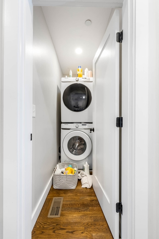20 Grimes Street, Unit SF Boston, MA 02127 - Photo 6 of 15 a view of a hallway with washer and dryer