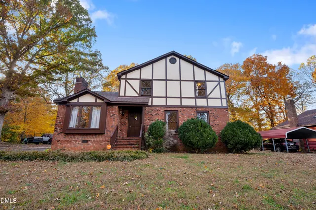 a view of a building with a yard