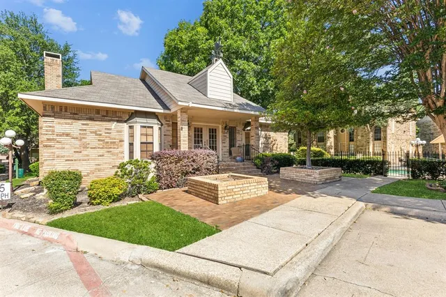 a view of a swimming pool with an outdoor seating and a yard