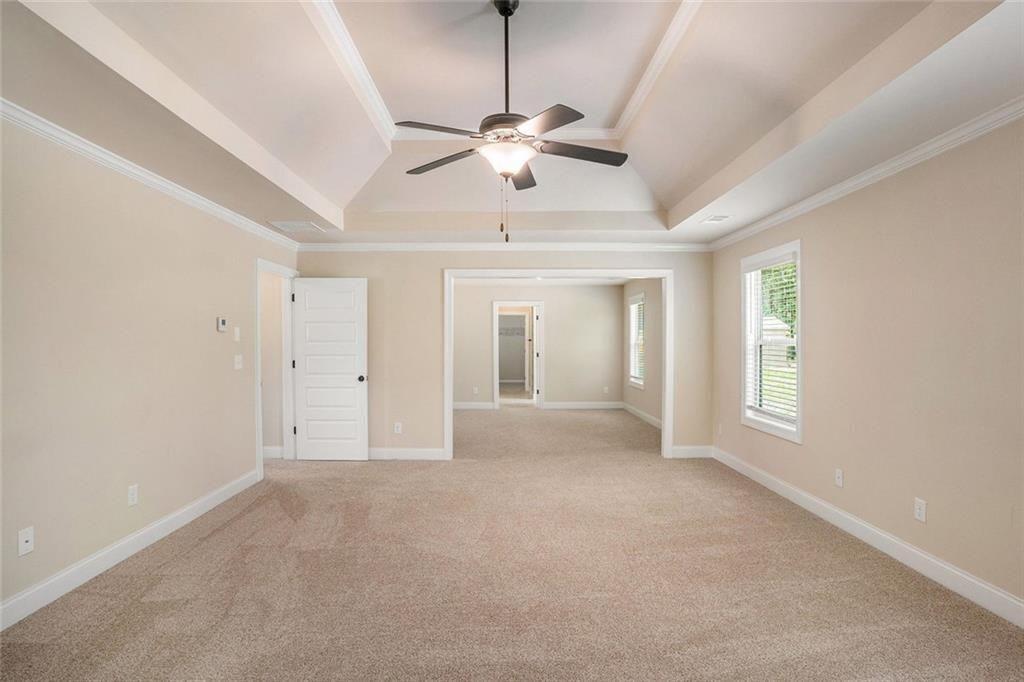 381 Homestead Circle Forsyth, GA 31029 - Photo 22 of 49 a view of a room with window and ceiling fan