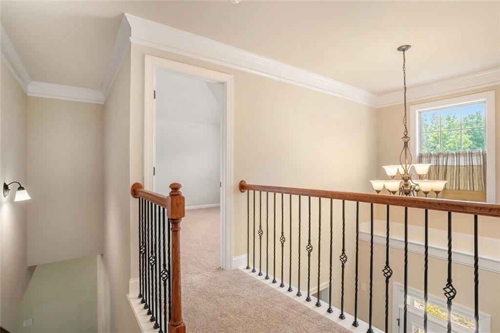 381 Homestead Circle Forsyth, GA 31029 - Photo 28 of 49 a view of a hallway with a window