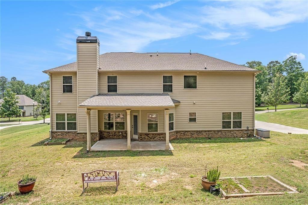 381 Homestead Circle Forsyth, GA 31029 - Photo 38 of 49 a view of a house with swimming pool