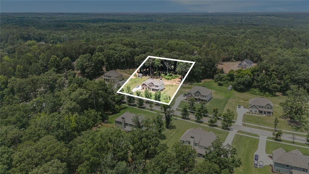 381 Homestead Circle Forsyth, GA 31029 - Photo 44 of 49 an aerial view of a house with a yard