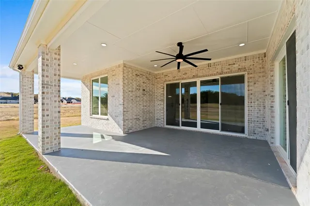 a view of front door with yard