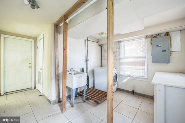 a bathroom with a bathtub and a sink