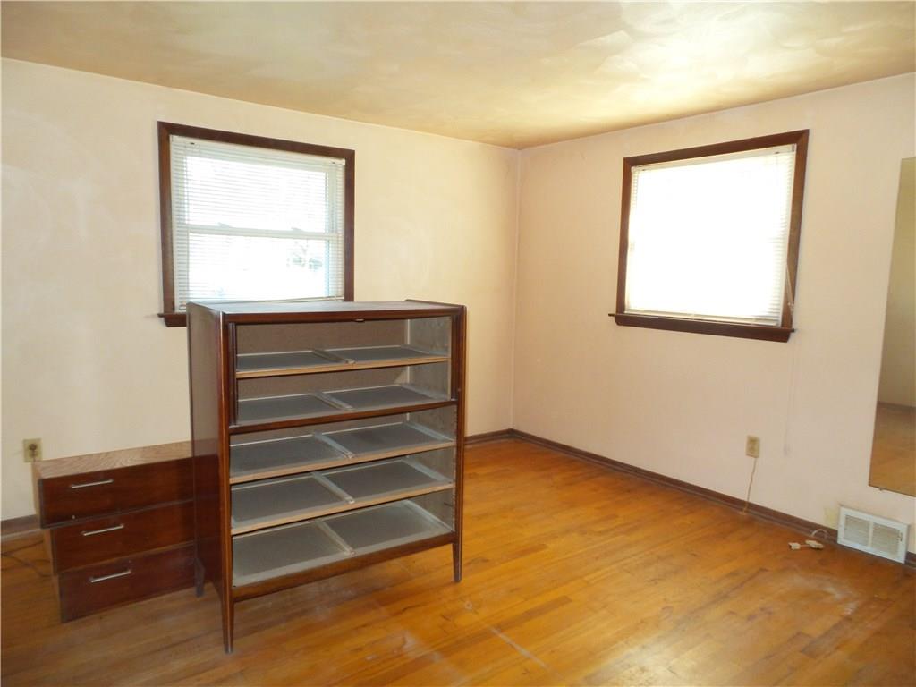 2230 Hyland Road Harrison City, PA 15636 - Photo 11 of 25 Master bedroom with hardwood floors, nice closet and 1/2 bath.