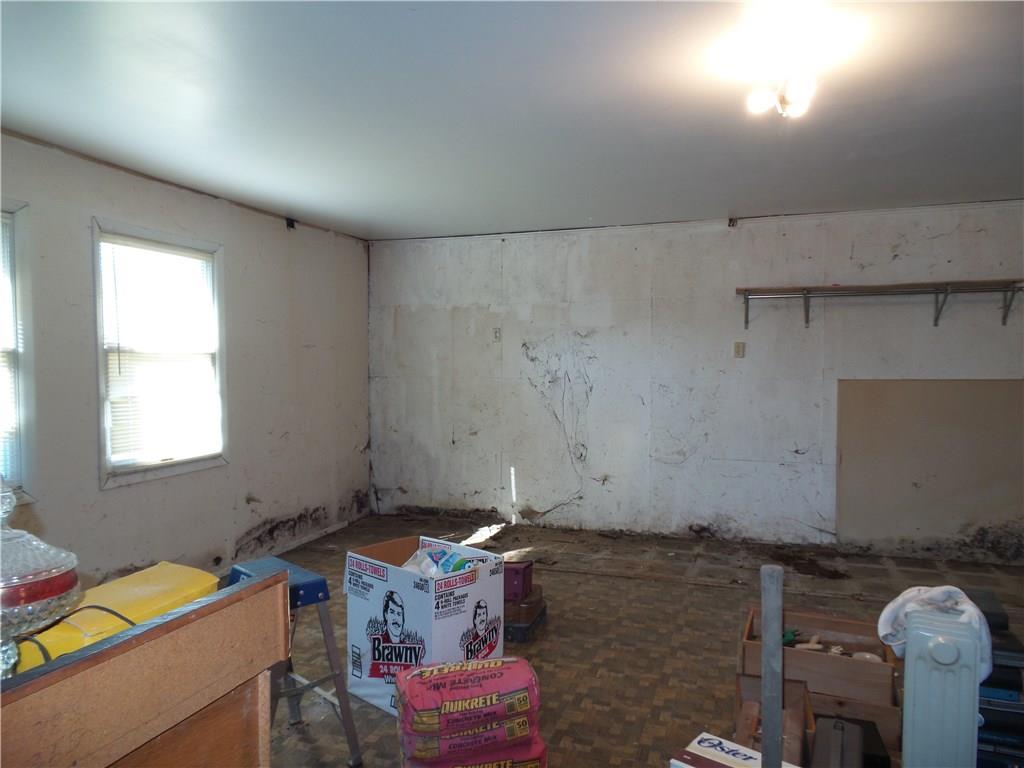 2230 Hyland Road Harrison City, PA 15636 - Photo 18 of 25 Garage was converted into a work room/laundry area. Could easily be converted back to a double car garage. Has doorway to back yard.