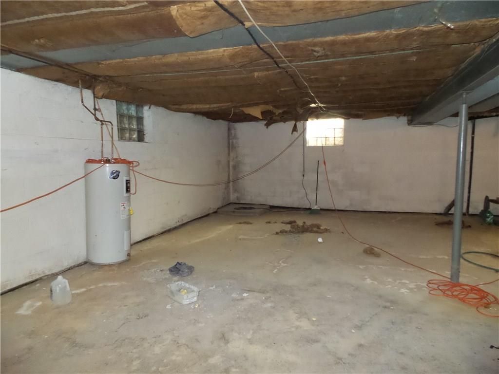 2230 Hyland Road Harrison City, PA 15636 - Photo 20 of 25 Basement has 2 sump pumps and french drains.