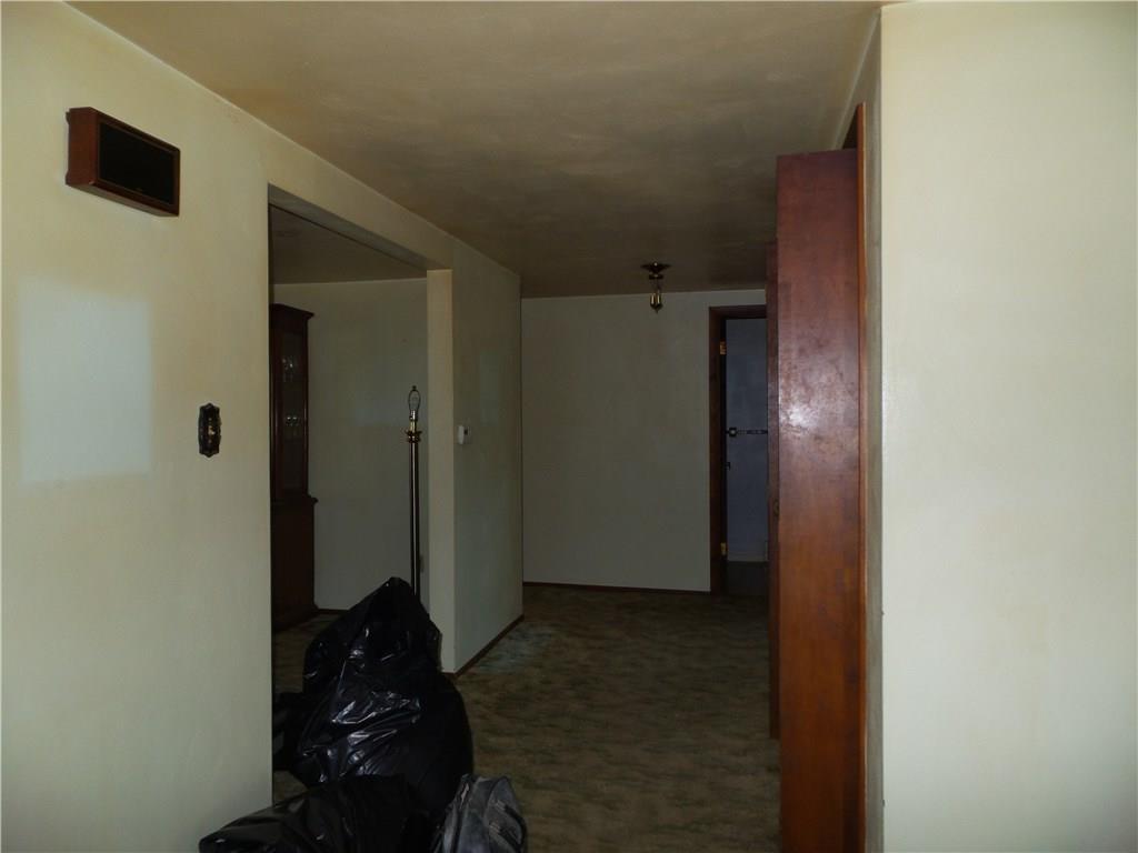 2230 Hyland Road Harrison City, PA 15636 - Photo 6 of 25 Dining room on the left, coat closet on the right. Hall leads to bedrooms and baths.