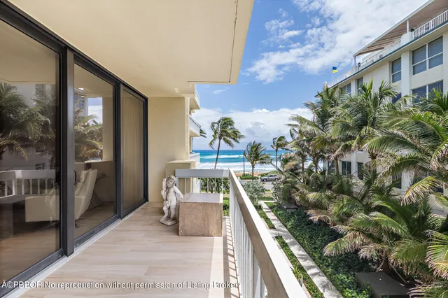 a view of balcony with furniture