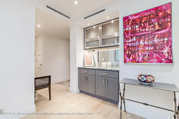 a room with cabinets and window