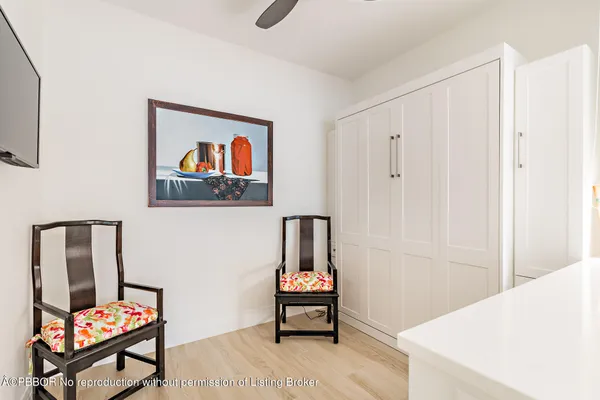 a bedroom with a bed and furniture