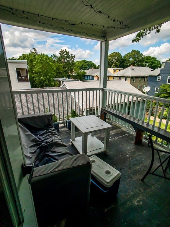 30 Spring Park Avenue, Unit 3 Boston, MA 02130 - Photo 12 of 12 a view of a balcony with chairs