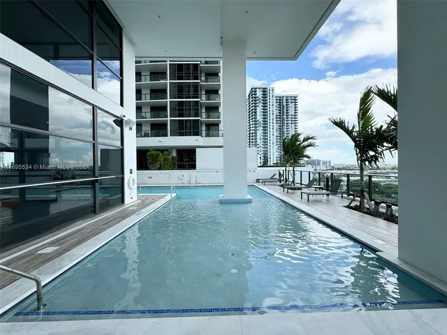 a view of a living room and window