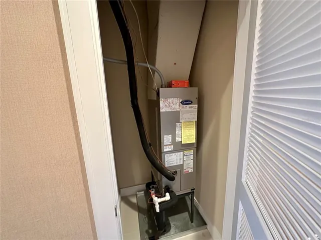 an entryway with a mirror