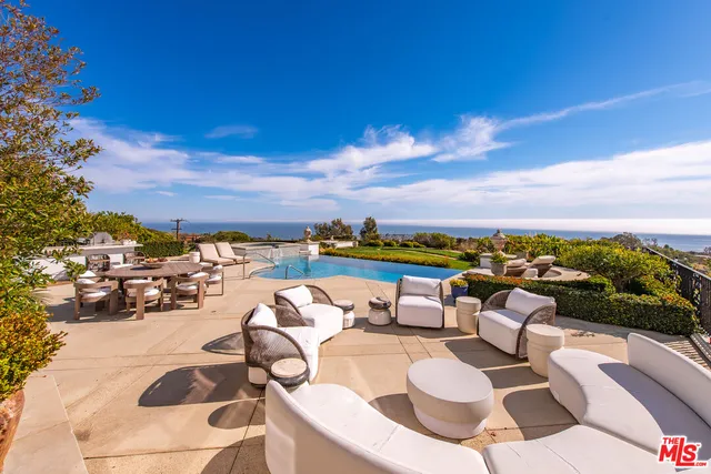 a view of a terrace with furniture