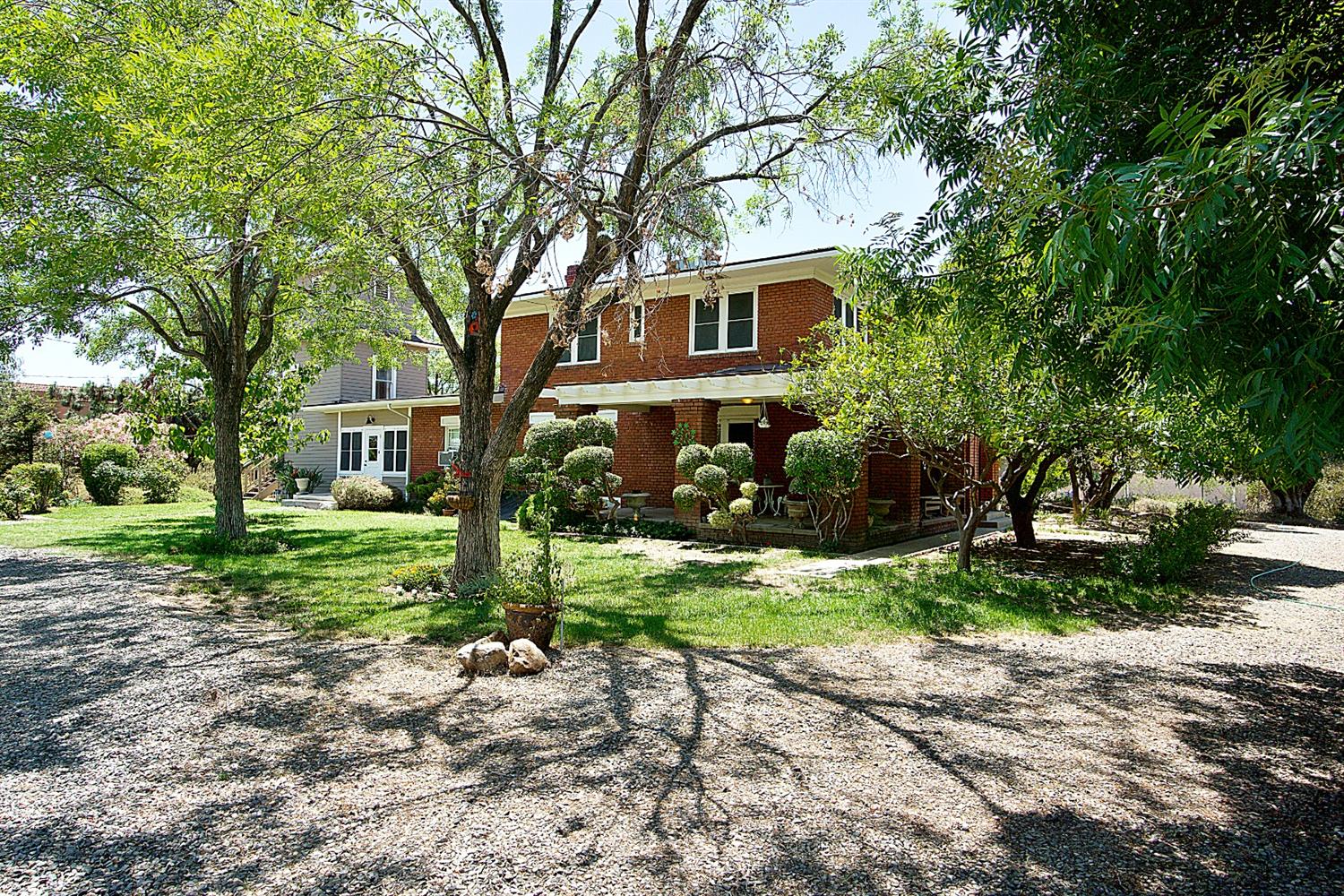 2220 Dewitt Avenue Clovis, CA 93612 - Photo 1 of 44 a front view of a house with a yard and trees