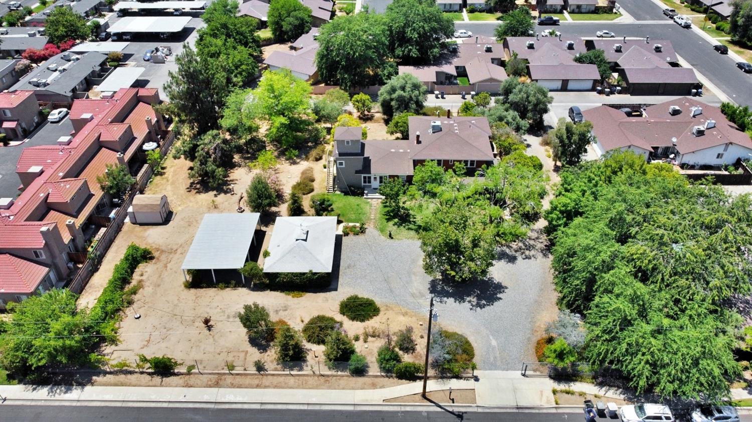 2220 Dewitt Avenue Clovis, CA 93612 - Photo 2 of 44 an aerial view of multiple houses with yard