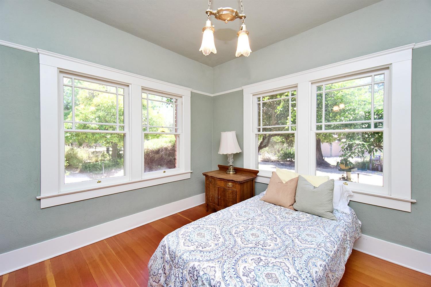 2220 Dewitt Avenue Clovis, CA 93612 - Photo 12 of 44 a bedroom with a large bed and a window