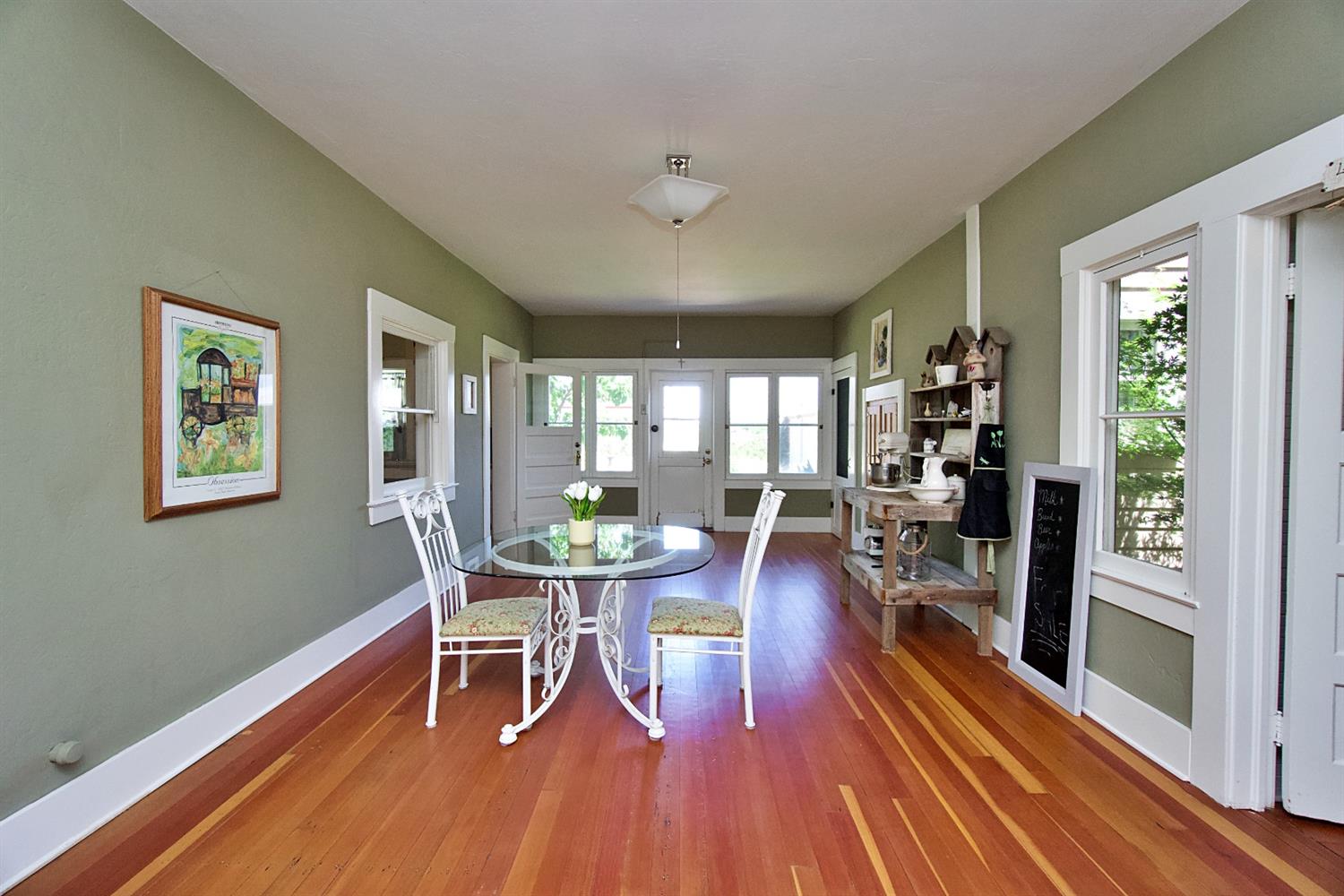 2220 Dewitt Avenue Clovis, CA 93612 - Photo 16 of 44 a dining room with wooden floor and large windows