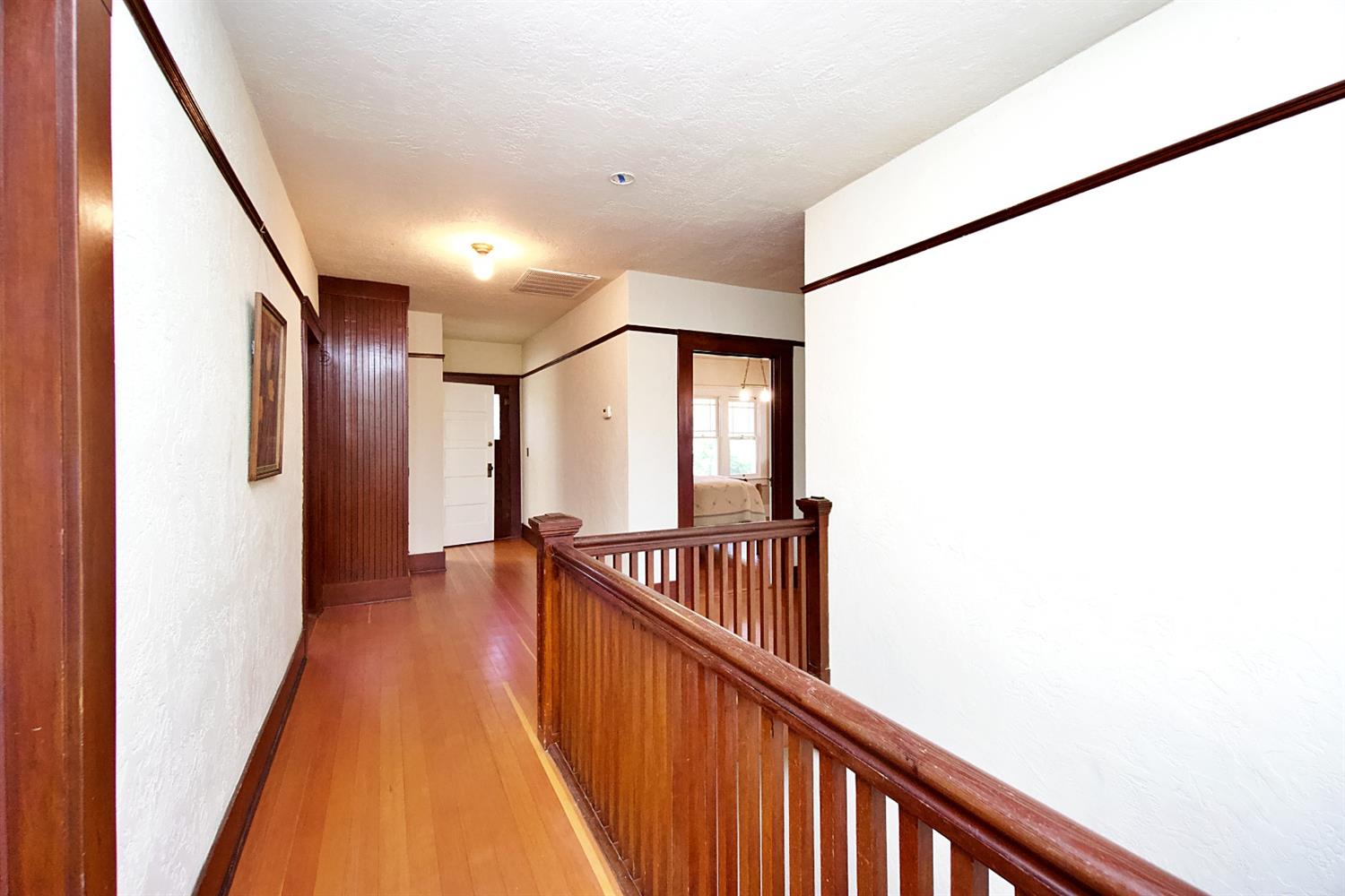 2220 Dewitt Avenue Clovis, CA 93612 - Photo 24 of 44 a view of a hallway with wooden floor