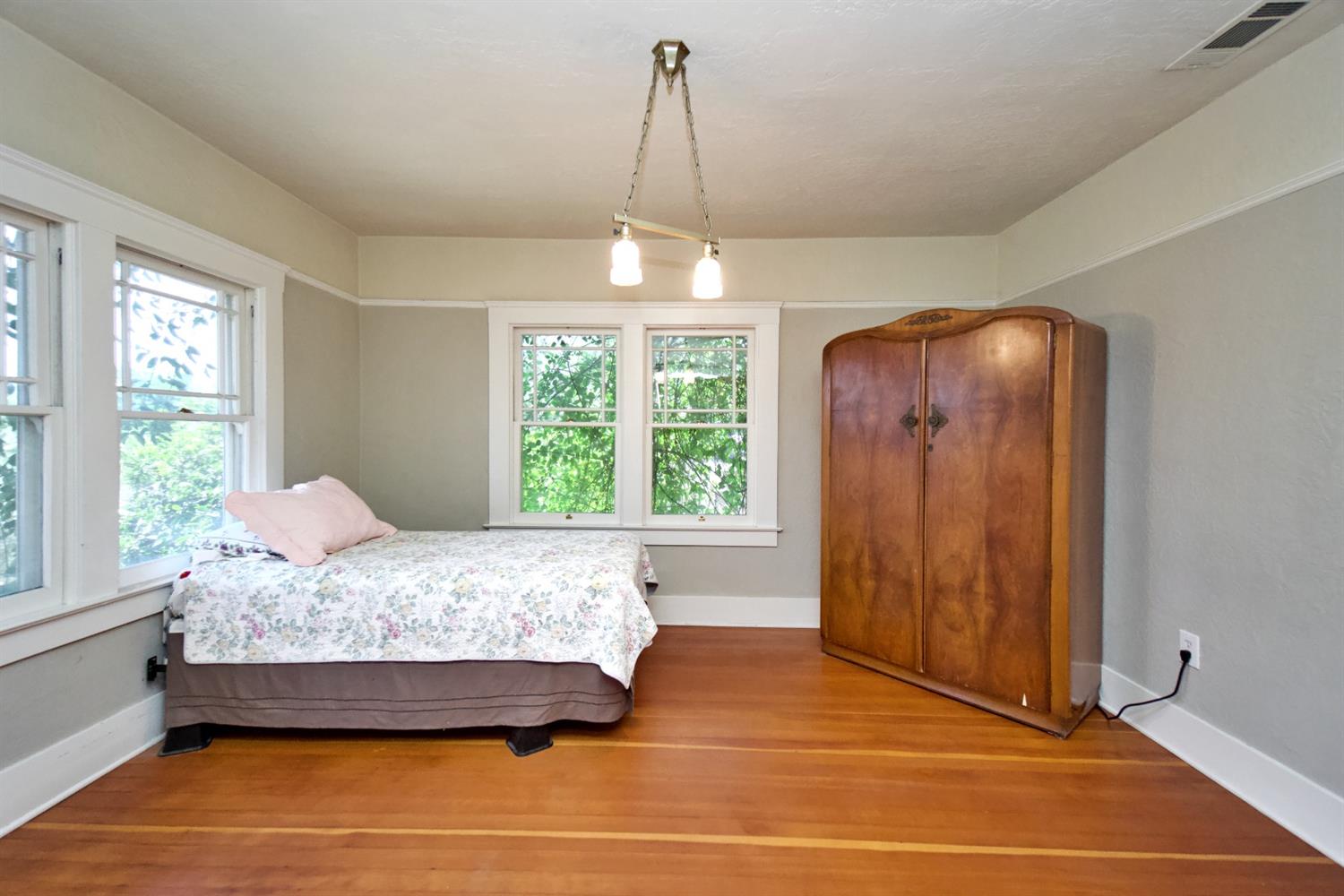 2220 Dewitt Avenue Clovis, CA 93612 - Photo 27 of 44 a bedroom with a bed and window