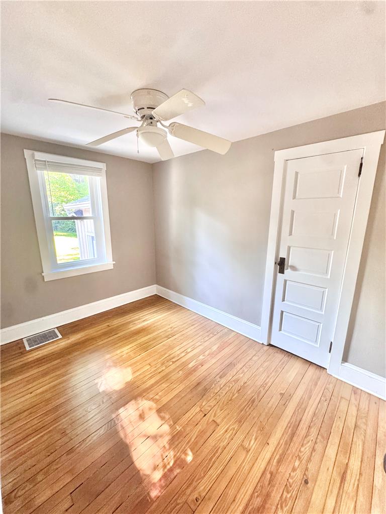 5454 Camp Meeting Road Center Valley, PA 18034 - Photo 15 of 27 Warm wood flooring extends throughout this light-filled room, promising comfort and versatility.