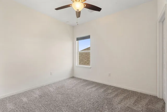 a bathroom with a sink a mirror and a toilet
