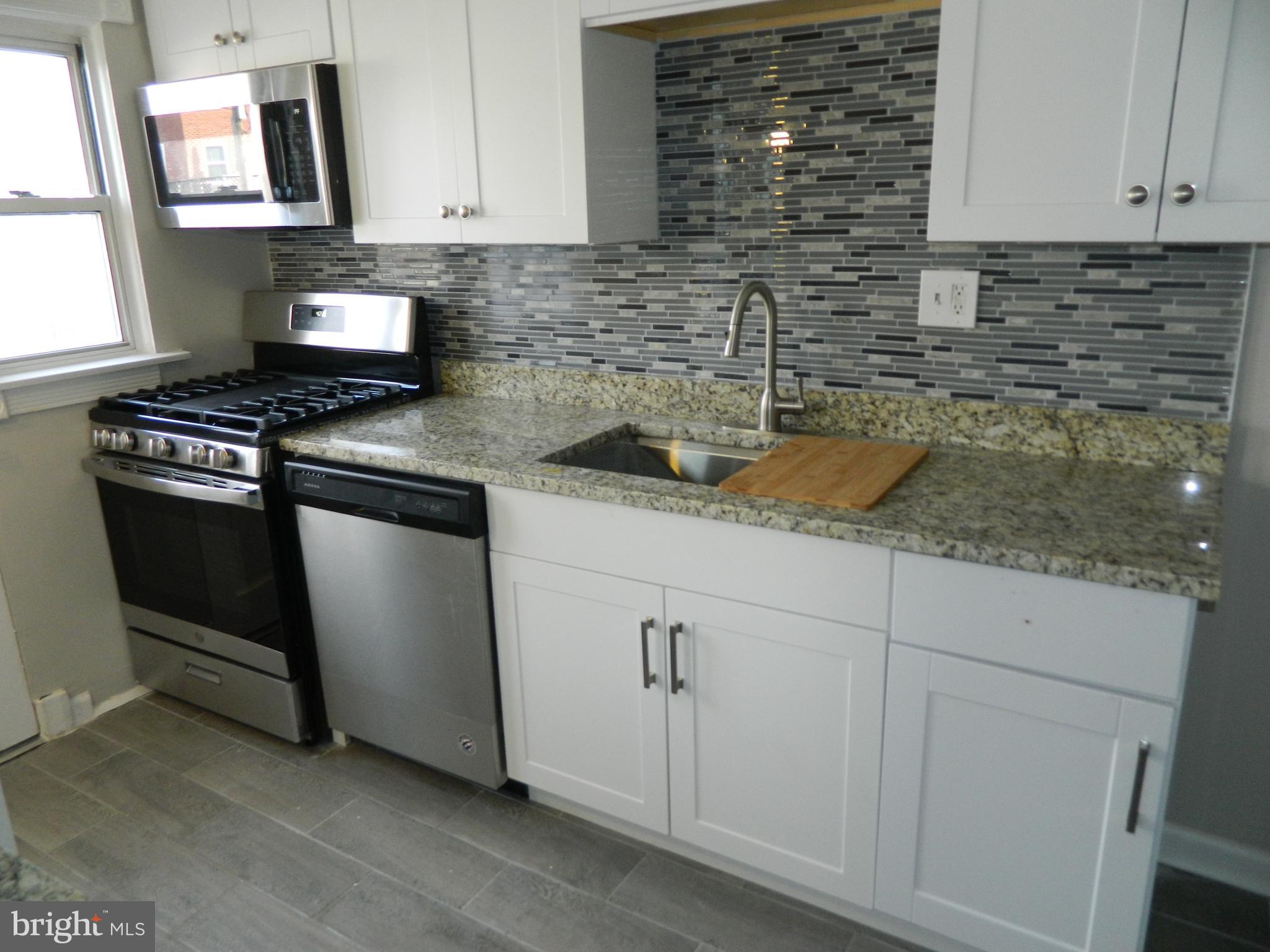1002 Arncliffe Road Baltimore, MD 21221 - Photo 4 of 18 ceramic tile floor